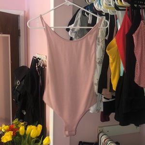 light pink body suit